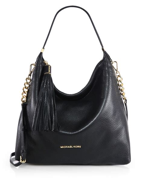 best leather handbags under 250 michael kors|Michael Kors black shoulder handbags.